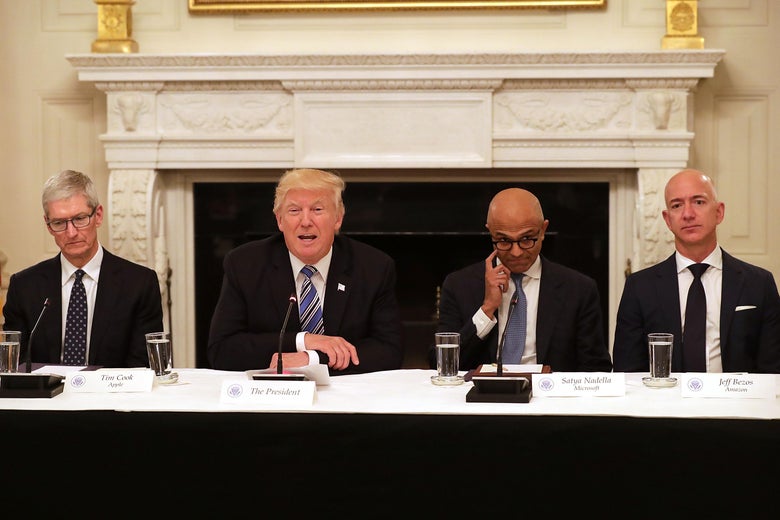WASHINGTON, DC - JUNE 19: U.S. President Donald Trump (2nd L) welcomes members of his American Technology Council, including (L-R) Apple CEO Tim Cook, Microsoft CEO Satya Nadella and Amazon CEO Jeff Bezos in the State Dining Room of the White House June 19, 2017 in Washington, DC. According to the White House, the council's goal is 'to explore how to transform and modernize government information technology.' (Photo by Chip Somodevilla/Getty Images)